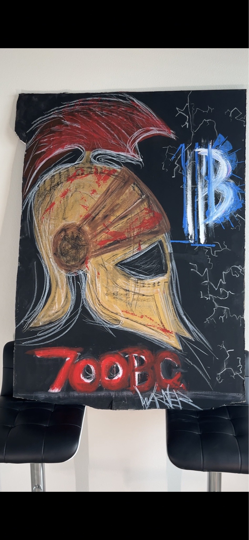 Submitted photo of Mixed media artwork bearing text '700BC'