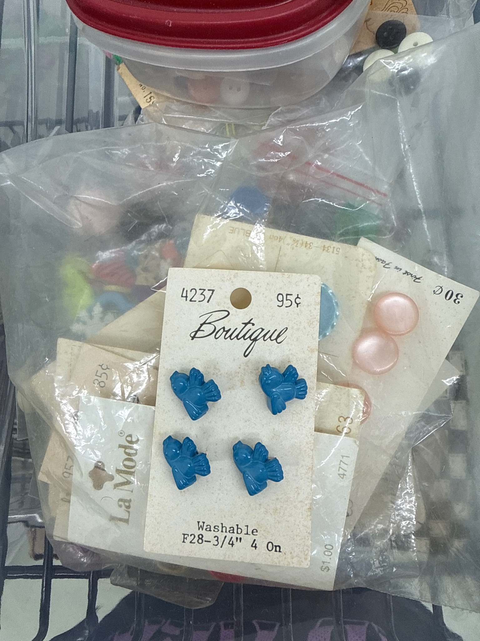Submitted photo of Vintage Boutique sewing buttons, unverified