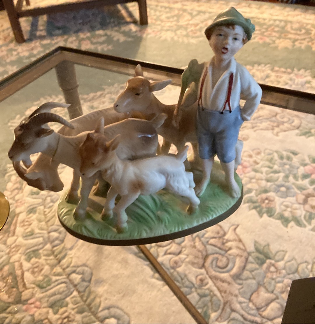 Submitted photo of Porcelain figurine group of a herder and goats