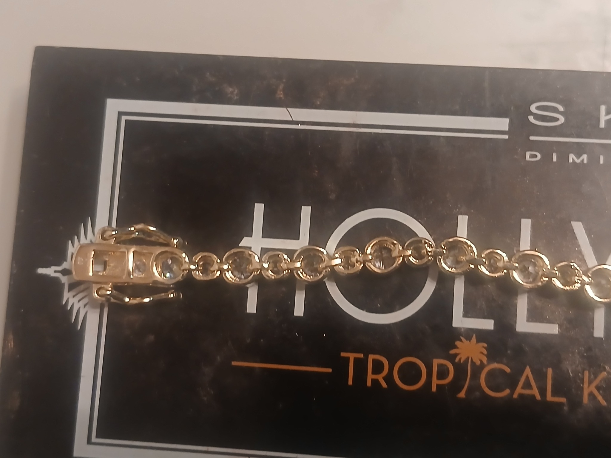 Submitted photo of Gold-tone gemstone tennis bracelet (not authenticated)
