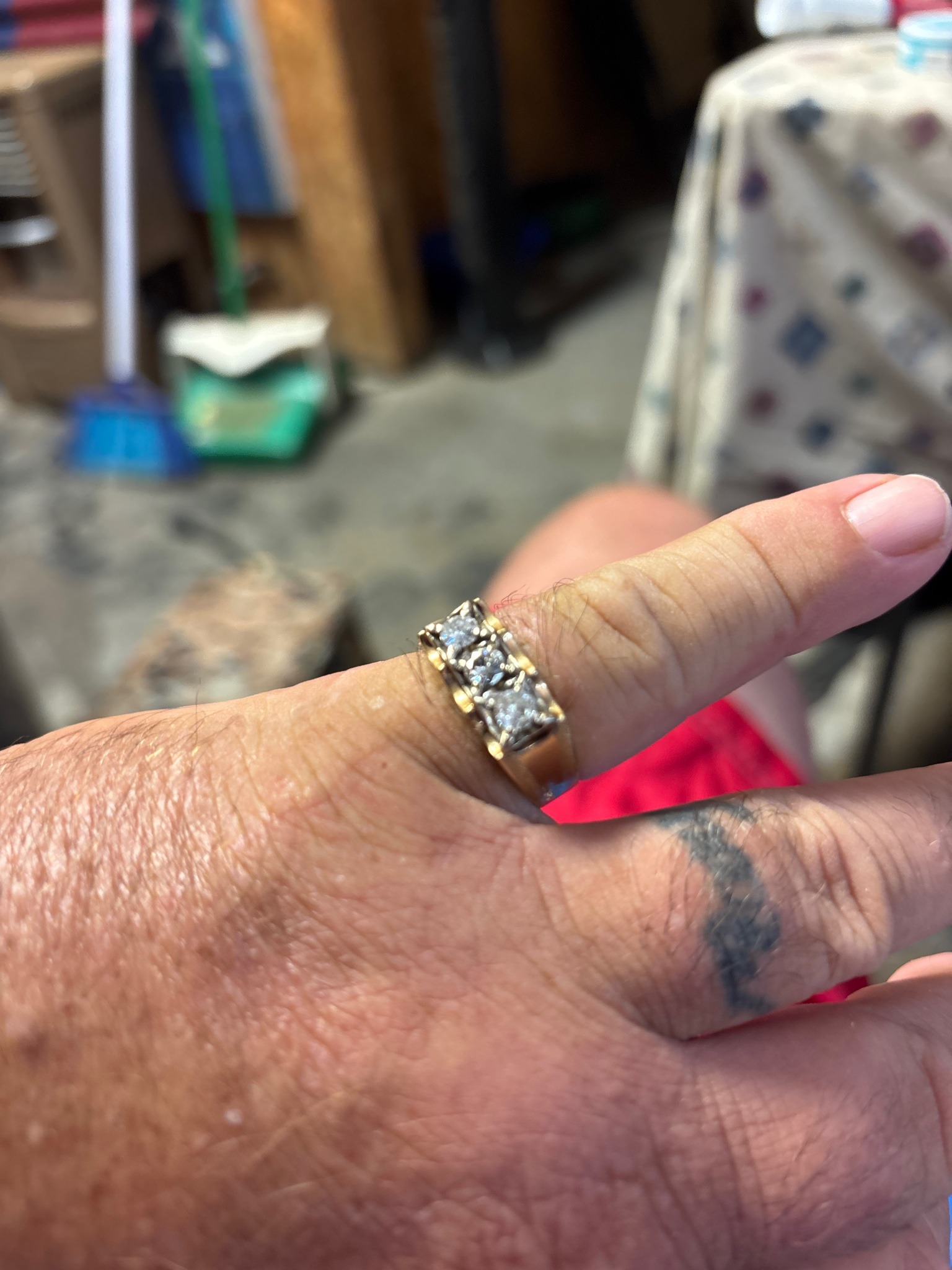Submitted photo of Gold and diamond multi-stone ring (unauthenticated)
