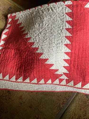 Red and Off-White Flying Geese Pattern Quilt