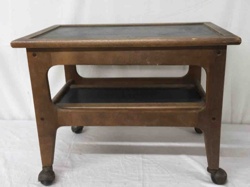 Vintage Wooden Two-Tiered Utility Table with Casters and Dark Inset Panels