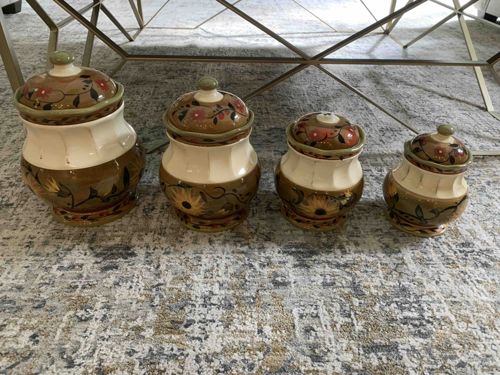 Set of Four Glazed Ceramic Floral Jars