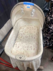 Infant Bassinet with Canopy and Electronic Features