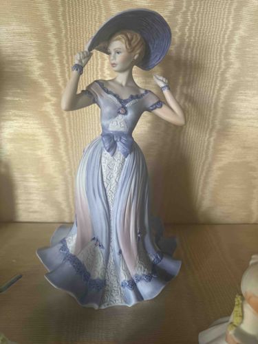 Porcelain Figurine of a Lady with Hat