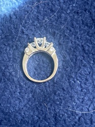 Three-Stone Diamond Ring with Pavé Shoulders