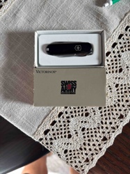 Victorinox Swiss Army Knife (Compact Model or similar)