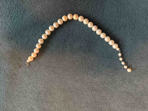 Graduated Ivory Colored Beaded Bracelet with Extender Chain