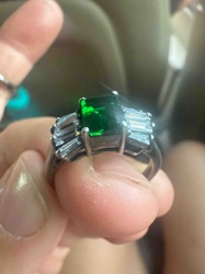 Silver-Toned Ring with Emerald-Cut Green Gemstone and Baguette Accents