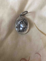 Classical Figure Relief Charm (dated 1980)