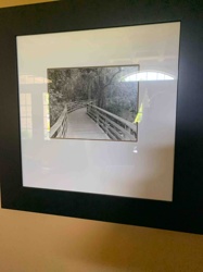 Framed Black and White Photograph of a Boardwalk