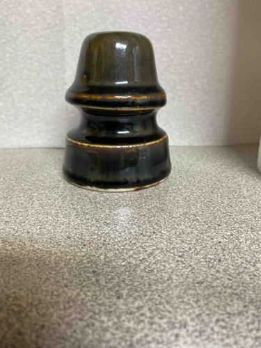 Antiquated Ceramic Power Line Insulator