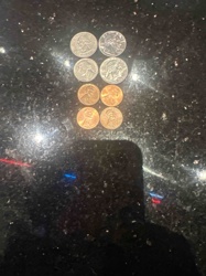 Assortment of U.S. Coins (Quarters, Dimes, Pennies)