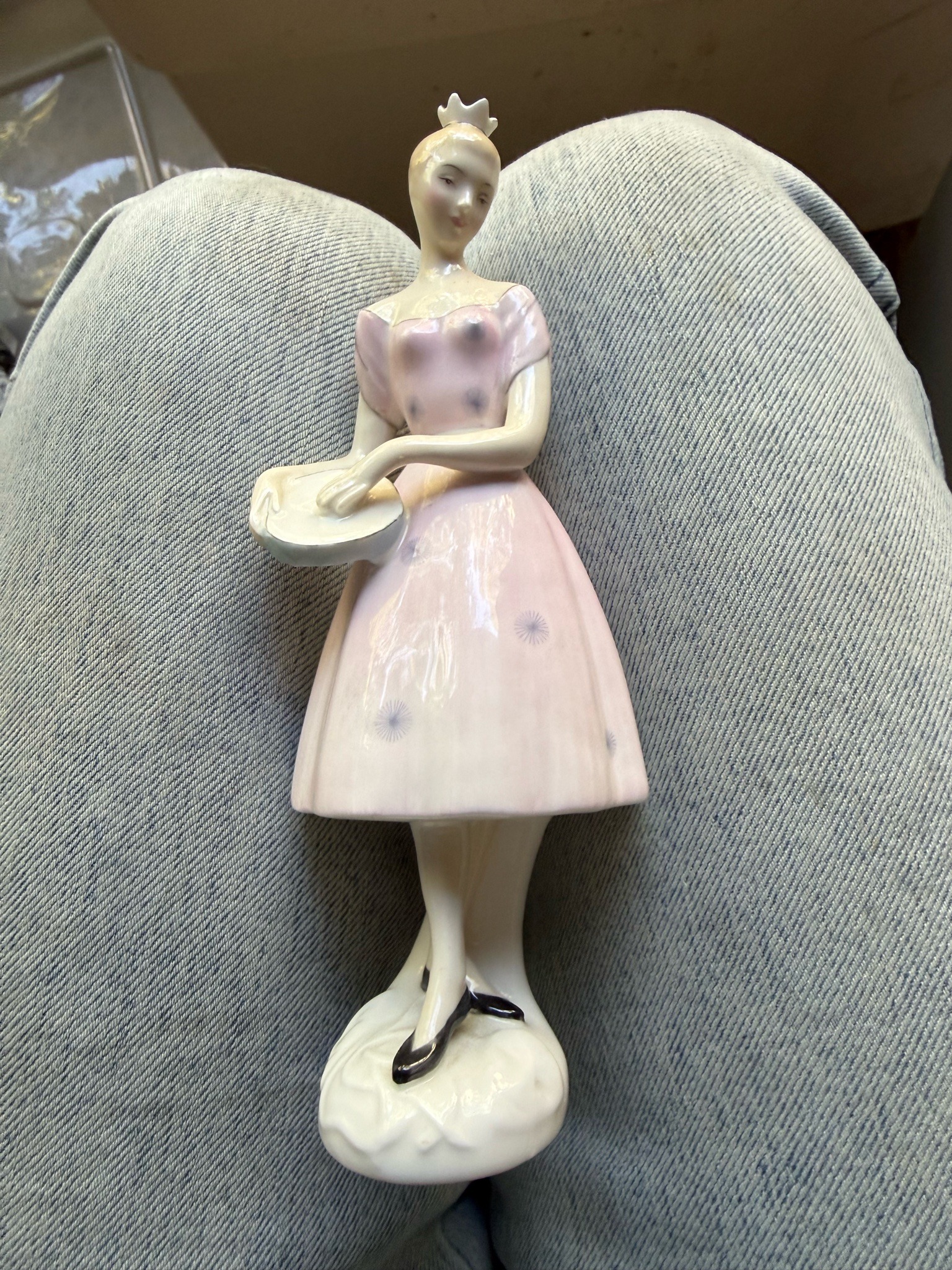 Submitted photo of Glazed ceramic figurine of a dancer holding a tambourine