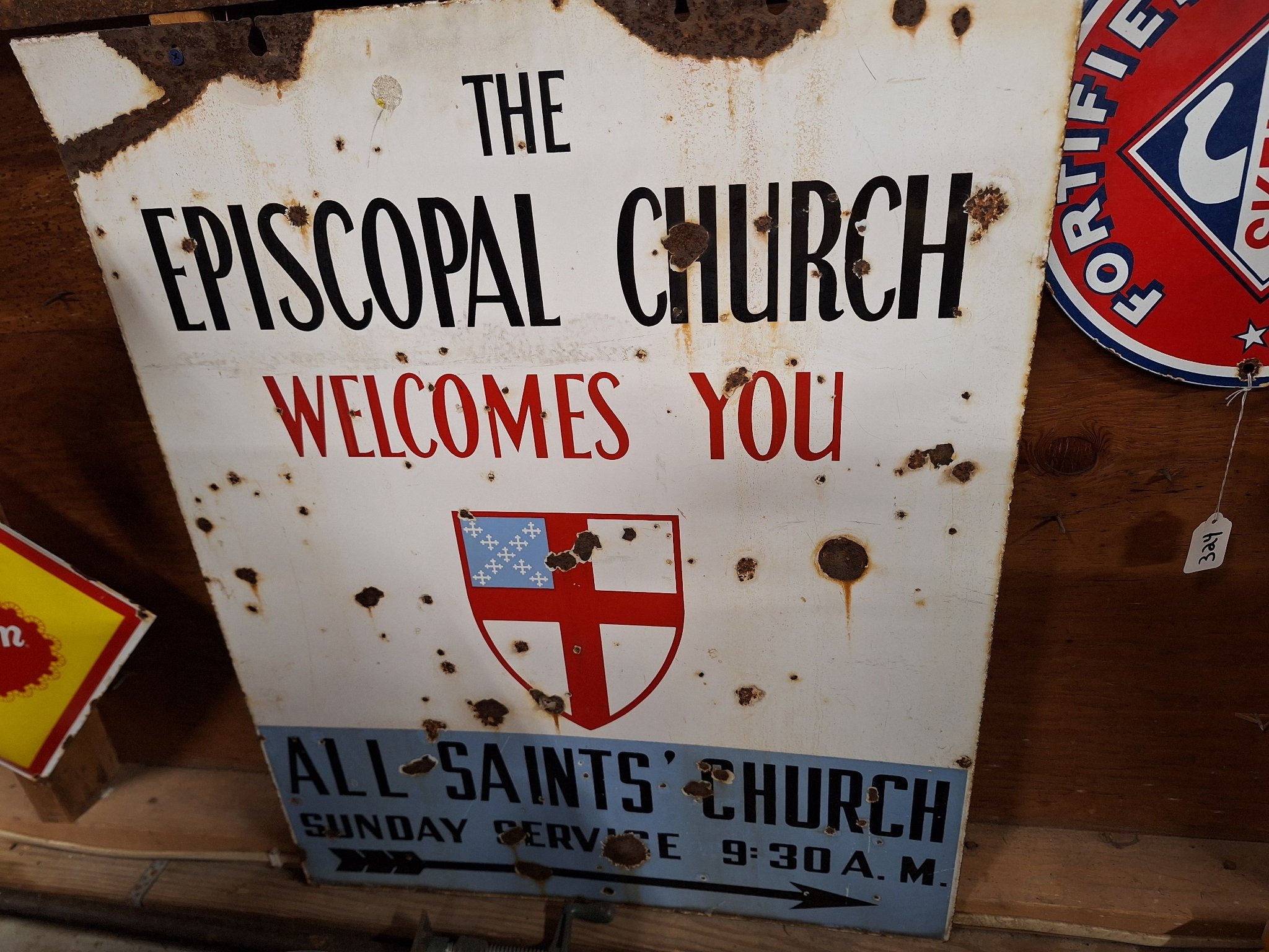Submitted photo of Vintage painted metal sign reading 'The Episcopal Church Welcomes You'