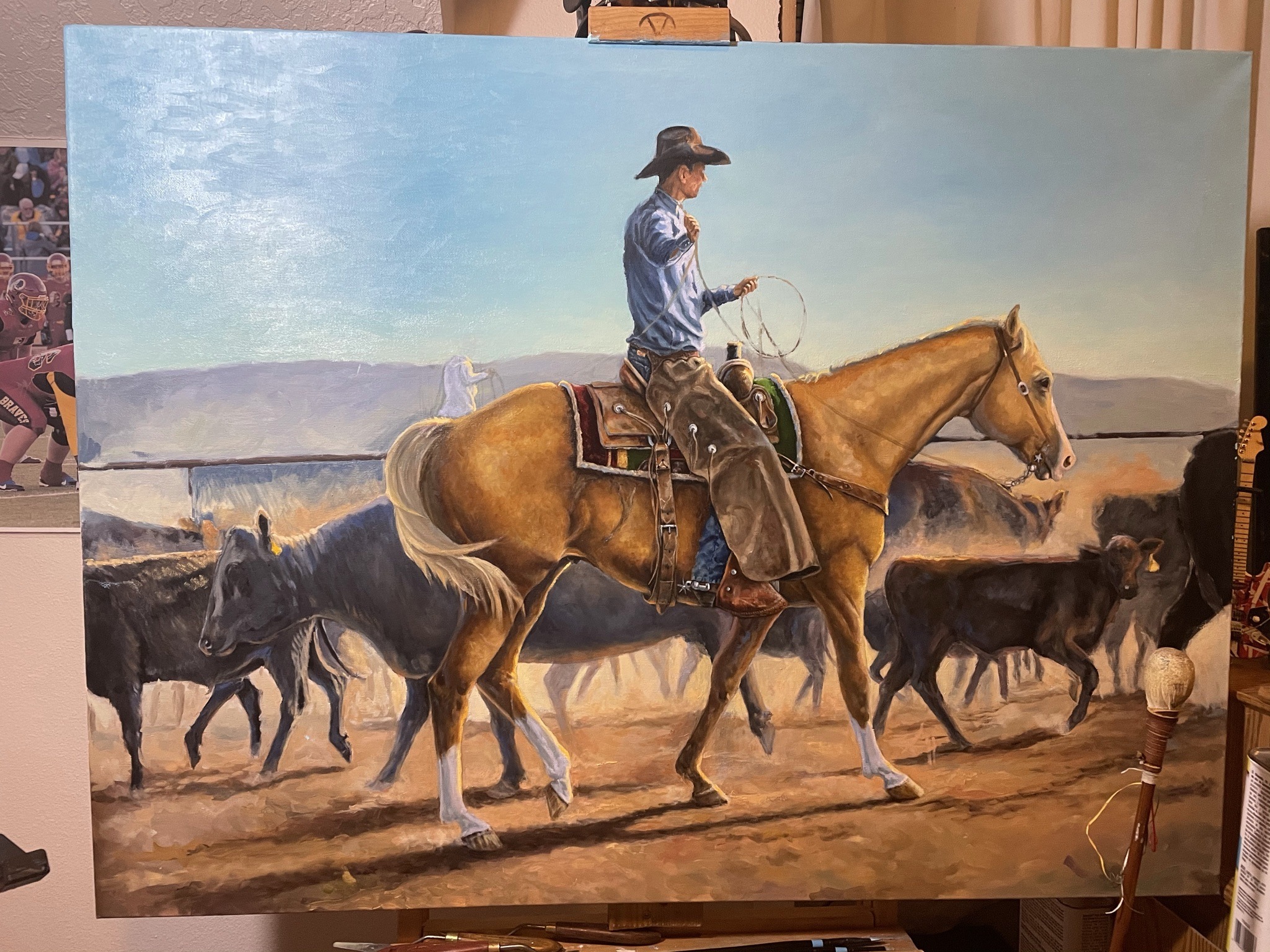 Submitted photo of Oil painting of a cowboy on horseback, unverified artist