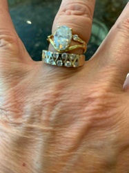 Gold-Toned Two-Ring Set with Oval and Round Clear Gemstones