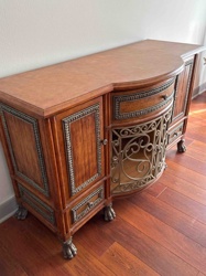 Ornate Wooden Sideboard with Curved Front and Claw Feet