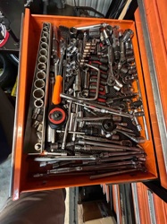 Assorted Mechanics' Tools in an Orange Drawer