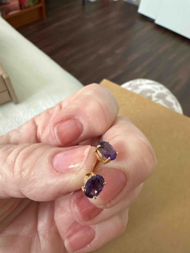 Oval Cut Amethyst Stud Earrings in Yellow Gold Settings