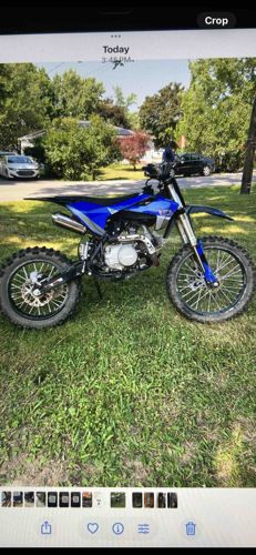 Blue and Black Dirt Bike