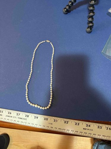 Graduated Pearl Necklace with Intricate Clasp