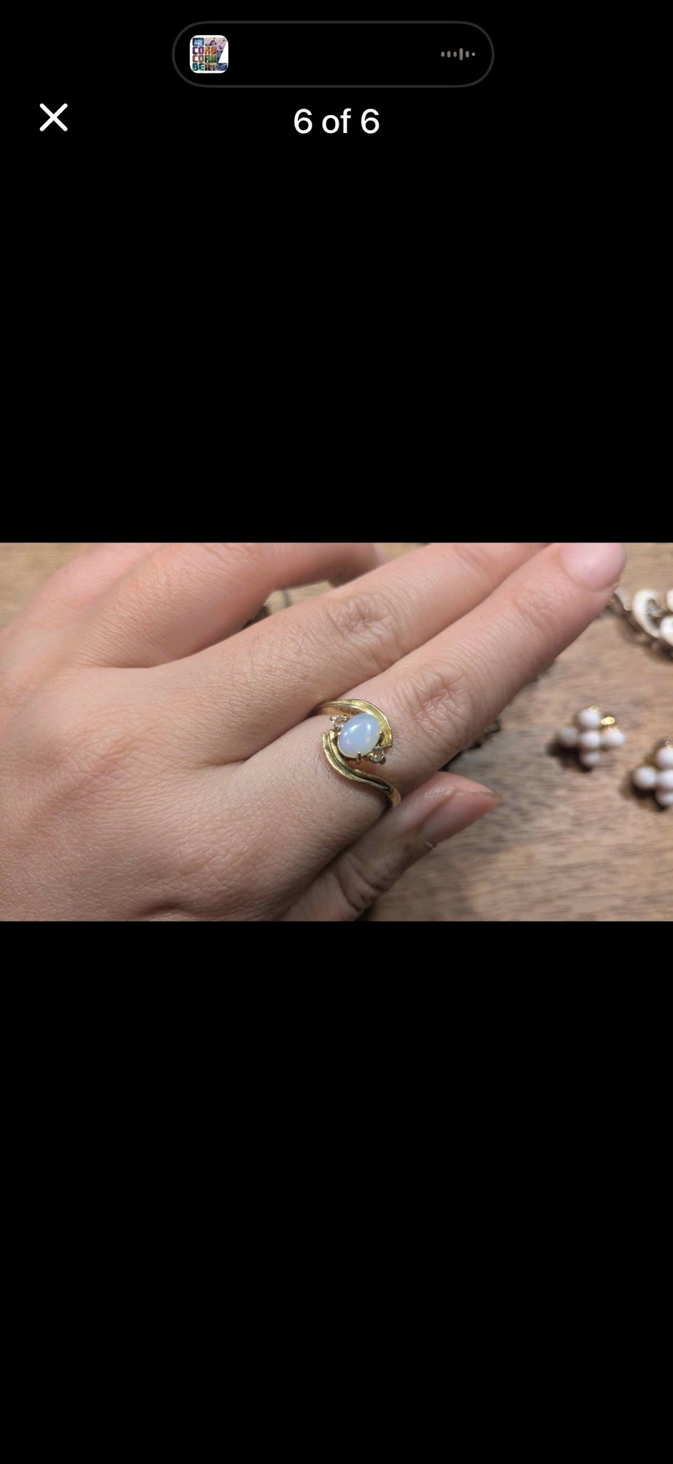 Submitted photo of Gold gemstone bypass ring