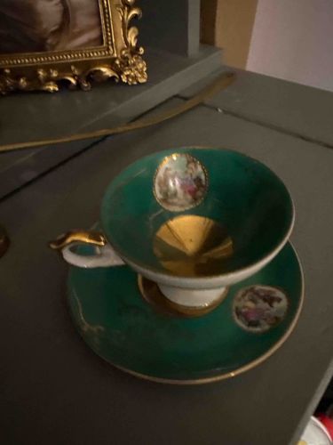 Emerald Green Gilt Porcelain Cup and Saucer Set with Figural Medallions