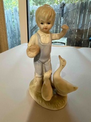 Boy with Geese Porcelain Figurine
