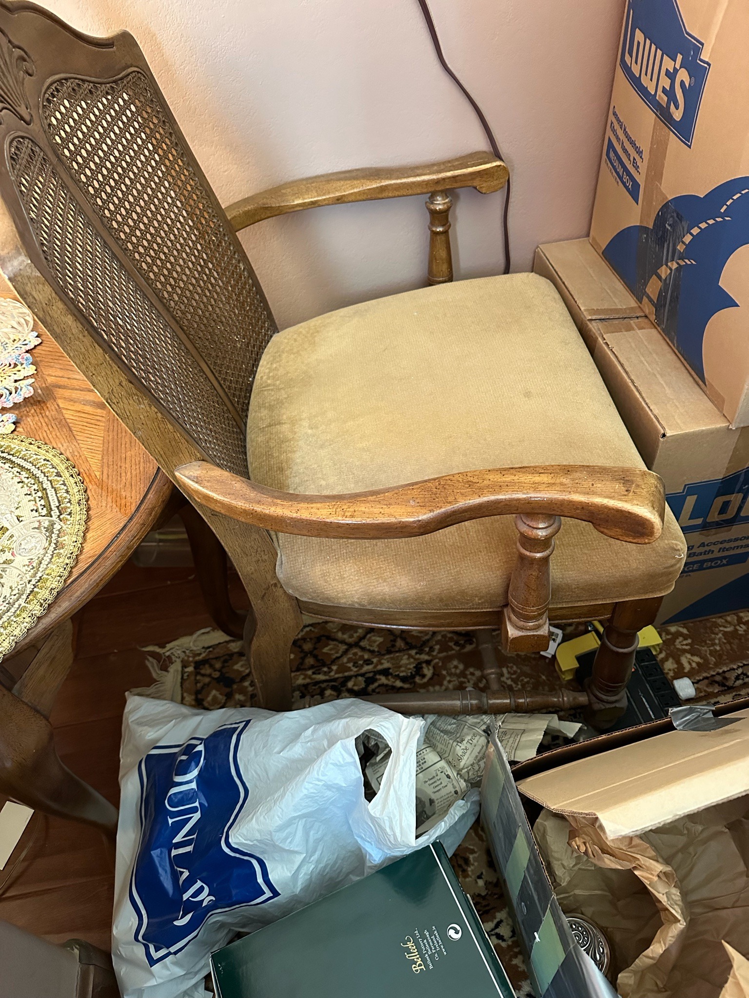 Submitted photo of Upholstered armchair with cane back