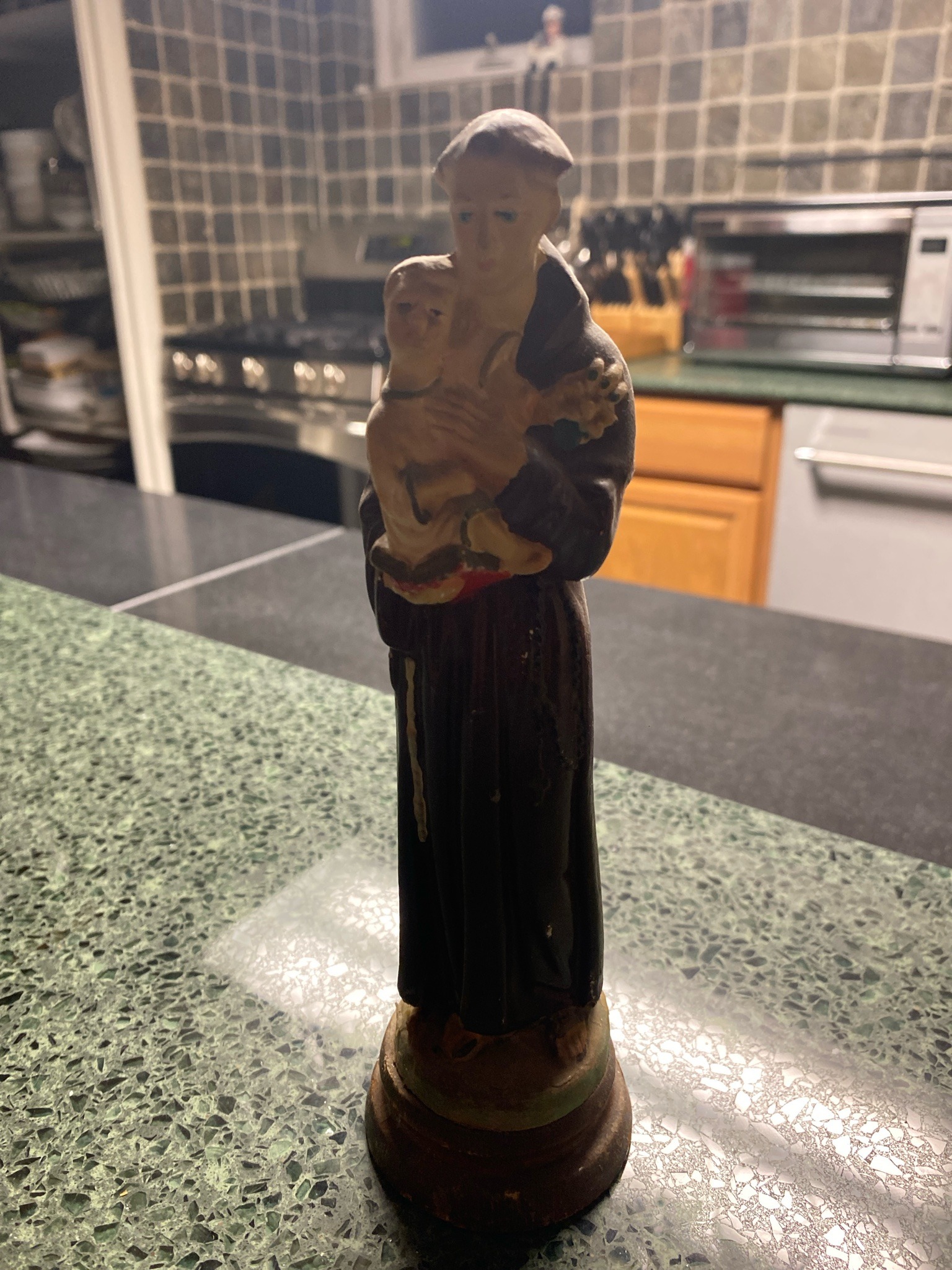 Submitted photo of Religious devotional figurine depicting Saint Anthony of Padua holding the Christ Child