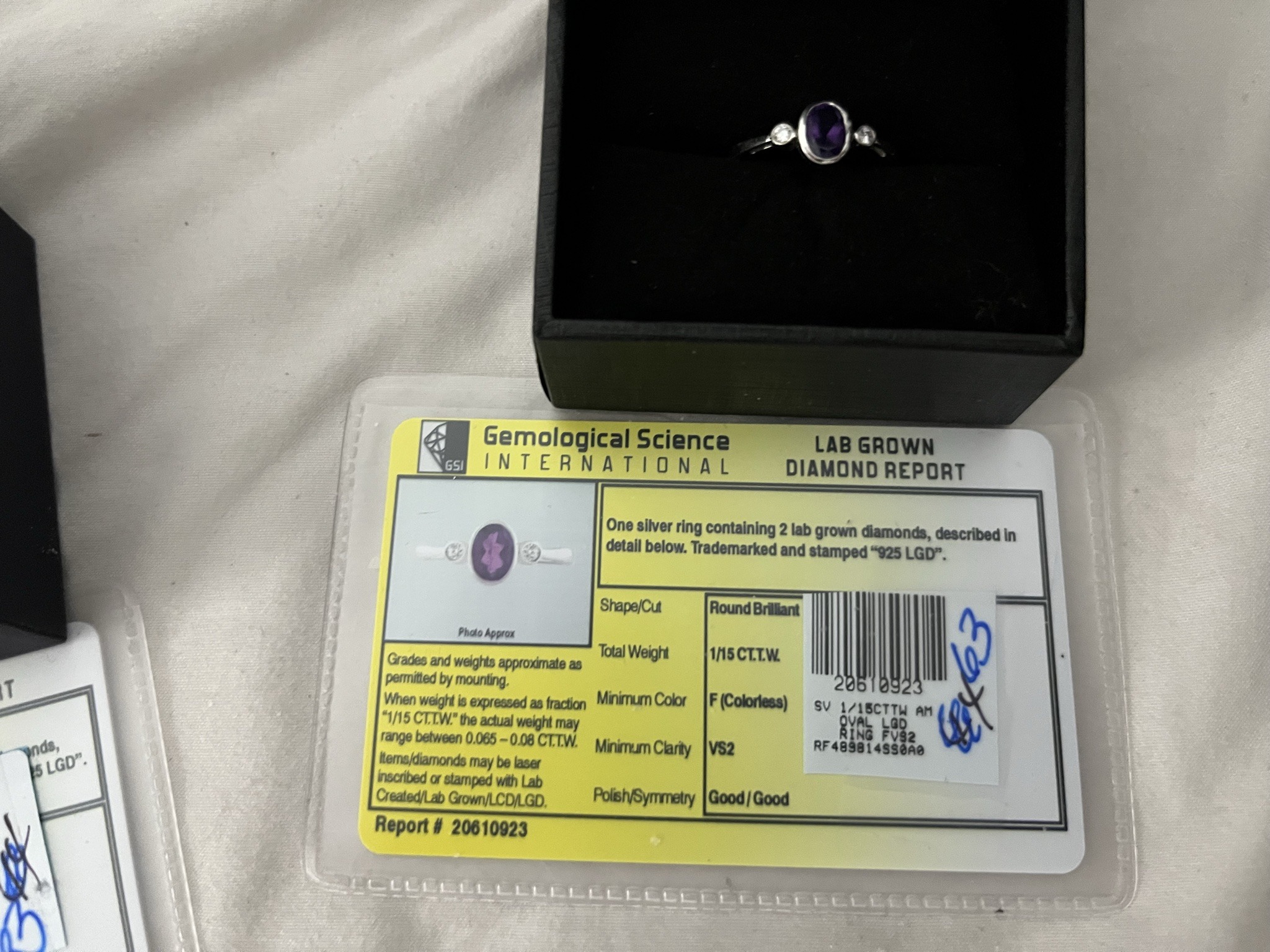 Submitted photo of Silver Ring with Lab-Grown Diamonds and Purple Center Stone (not authenticated)
