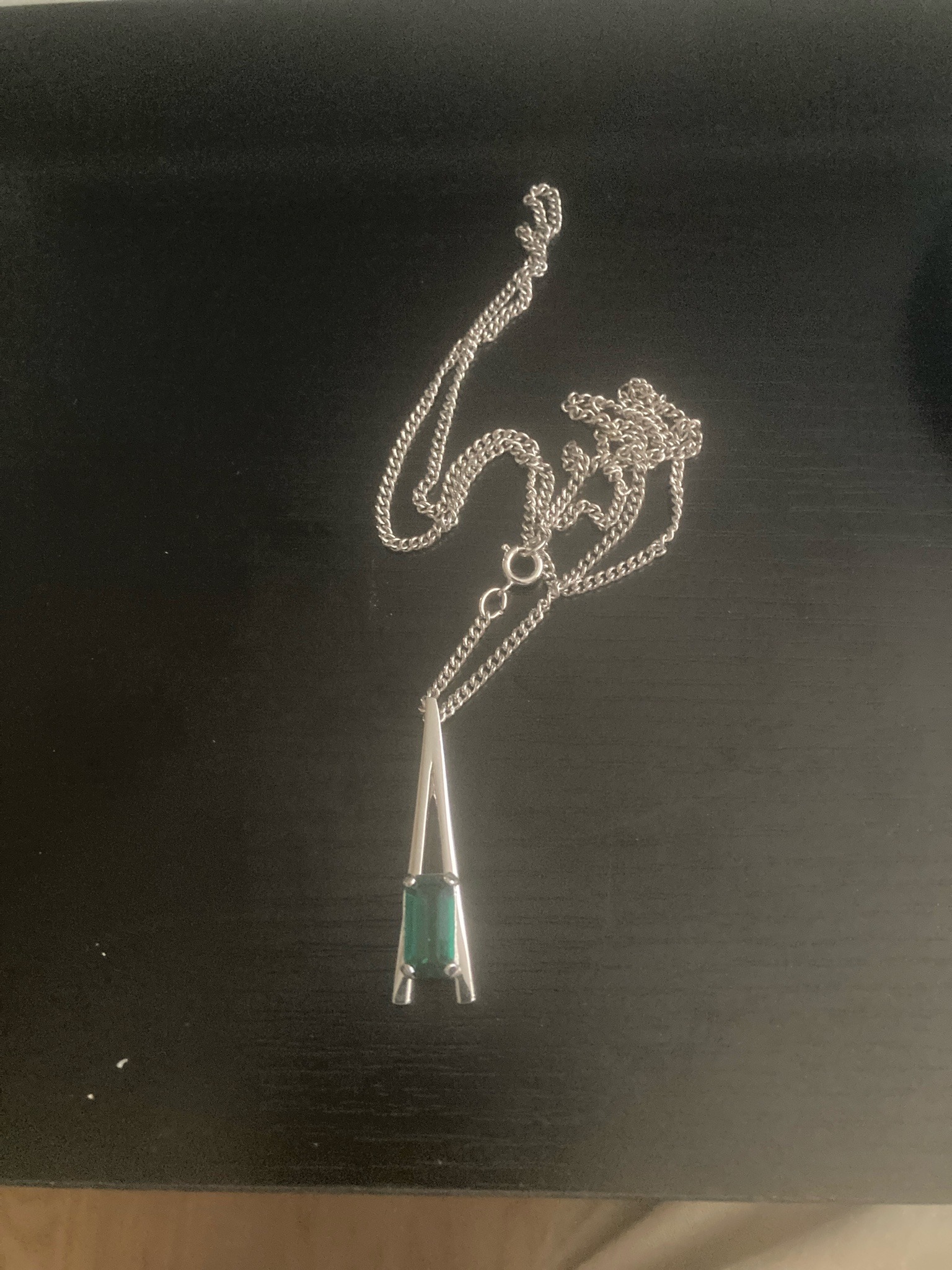 Submitted photo of Silver-tone pendant necklace with green stone