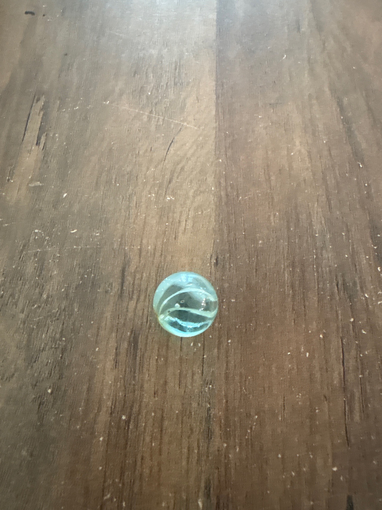 Submitted photo of Glass marble with internal swirl