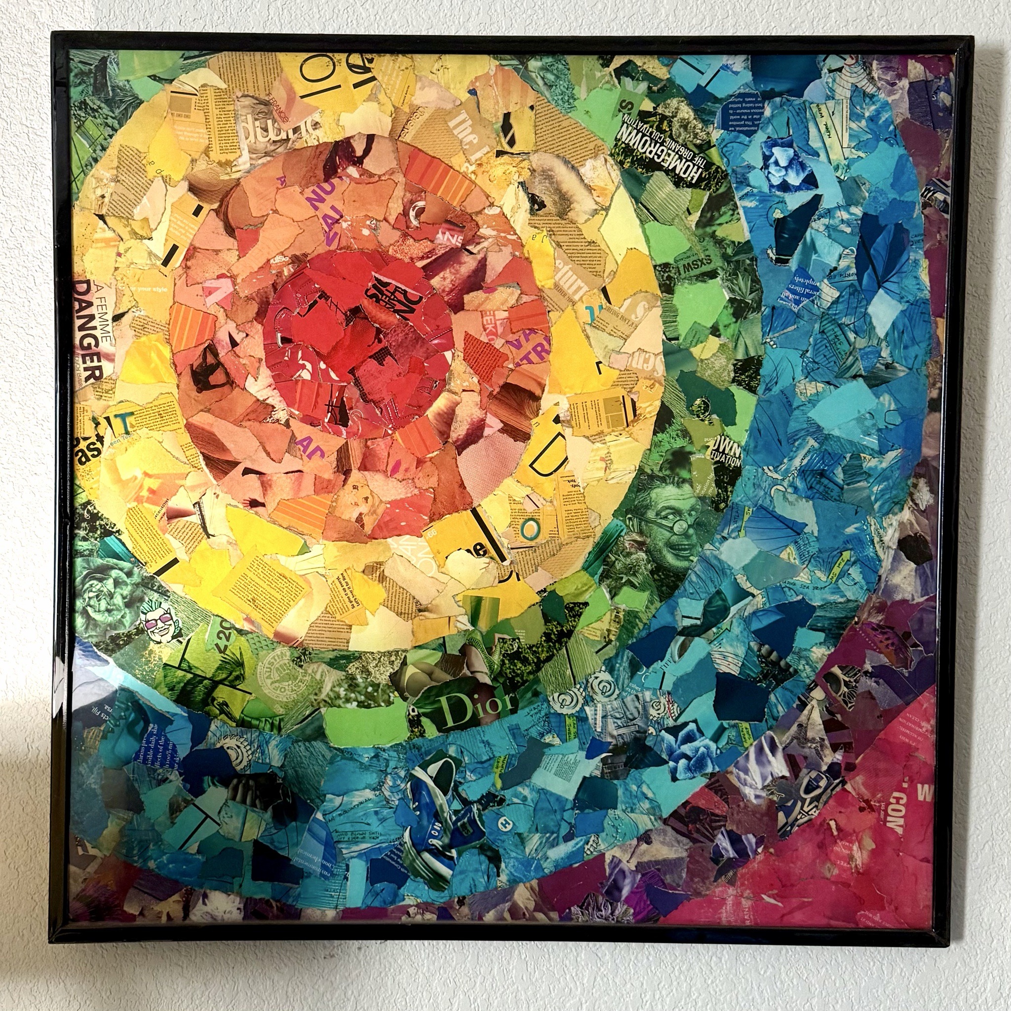 Submitted photo of Mixed media paper collage on wood panel