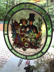 Stained Glass Suncatcher with Traditional German Couple Scene