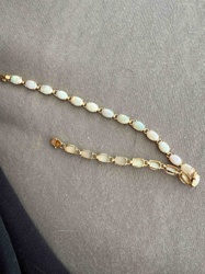 Two Gold-Toned Opal Bracelets