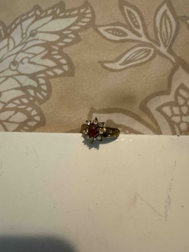 Gold-Toned Ring with Red Center Stone and Clear Accent Stones