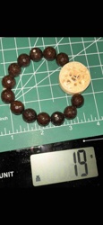 Faceted Dark Bead Bracelet with Carved Ivory-Colored Button