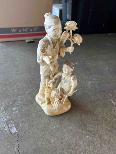 Carved Bone/Ivory Figurine of Two Traditional Asian Figures with Flowers