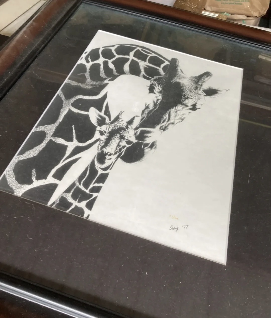 Submitted photo of Black and white print signed 'Craig '77'