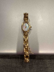 Women's Gold-Tone Oval Dial Wristwatch with Mother-of-Pearl Face and Intricate Bracelet Band