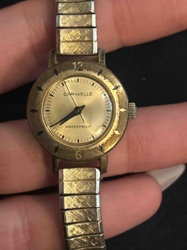 Caravelle Ladies' Gold-Tone Wristwatch with Expandable Band