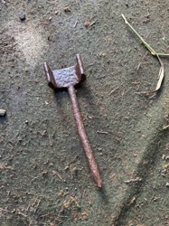 Rusty U-Shaped Metal Implement Component