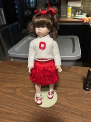 Porcelain Doll in Cheerleader Outfit