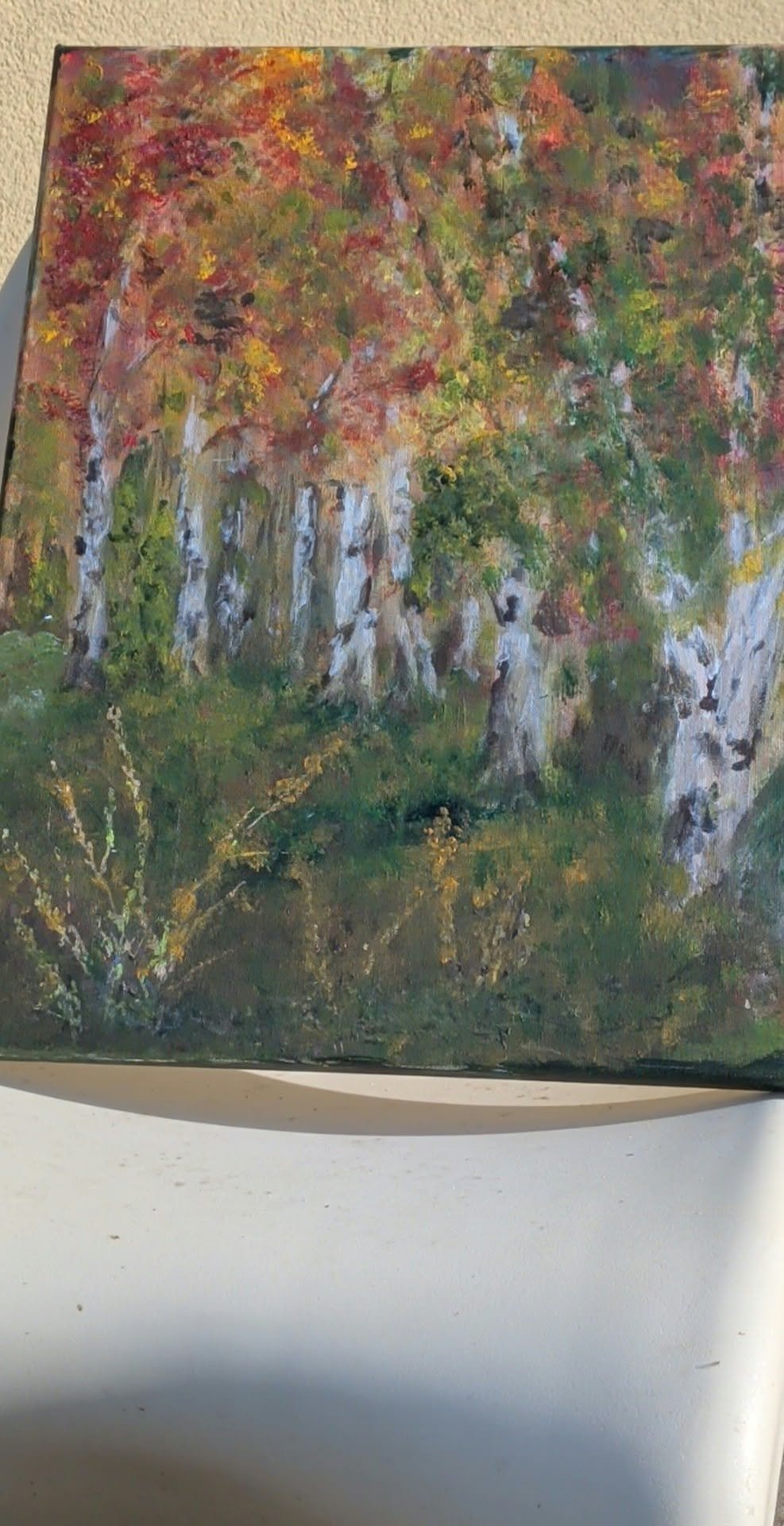 Submitted photo of Impressionist landscape oil painting depicting an autumn forest