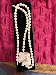 Beaded Necklace with Carved Elephant Pendant