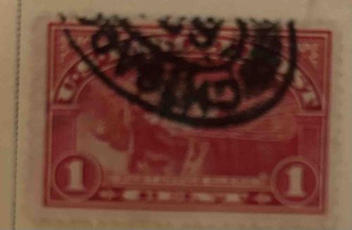 Used Red Postal Stamp with '1' Denomination