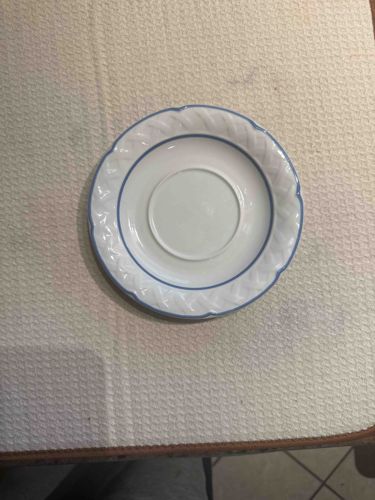 White Ceramic Saucer with Blue Trim and Embossed Rim